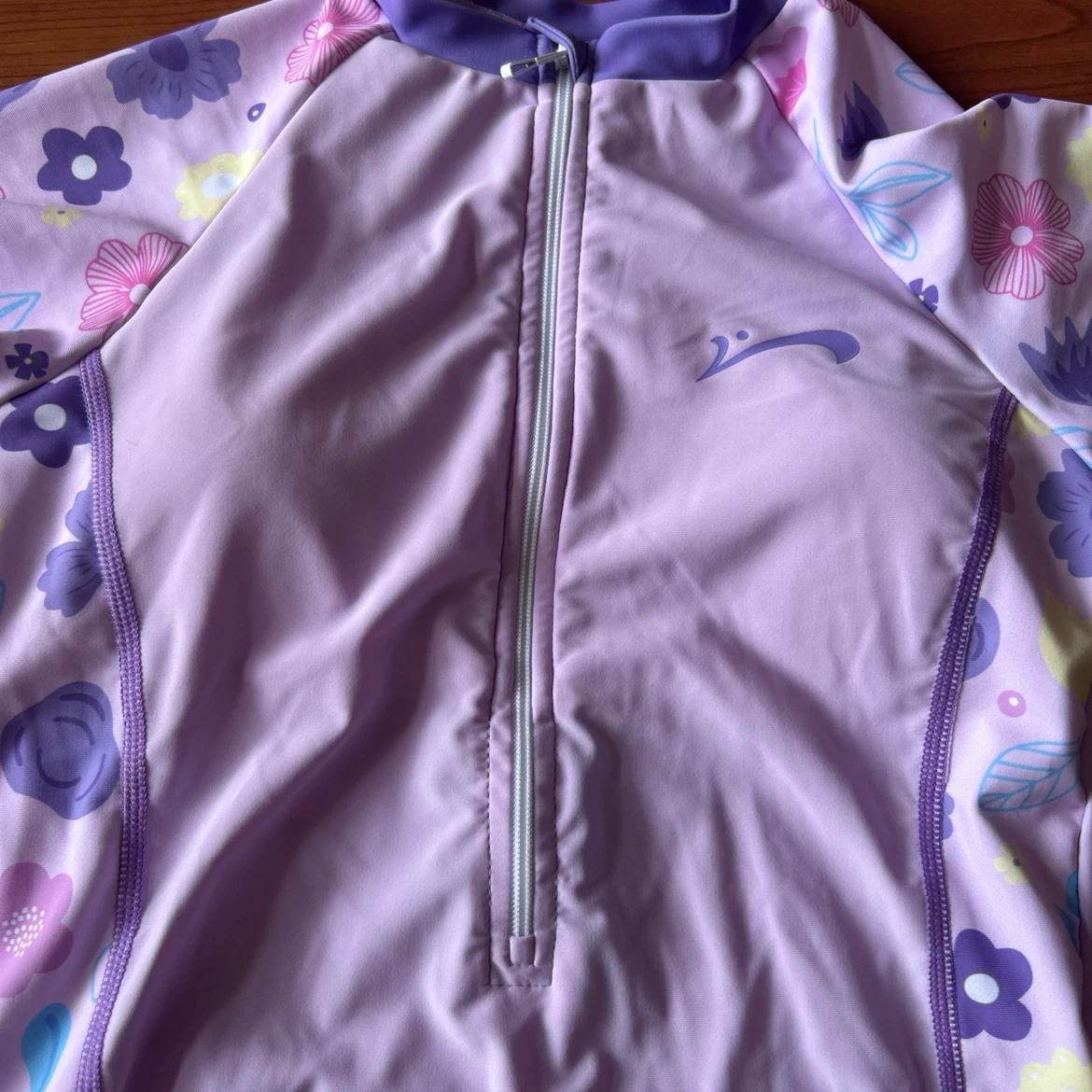 Children's Purple Swimsuit with Floral Sleeves - photo 2