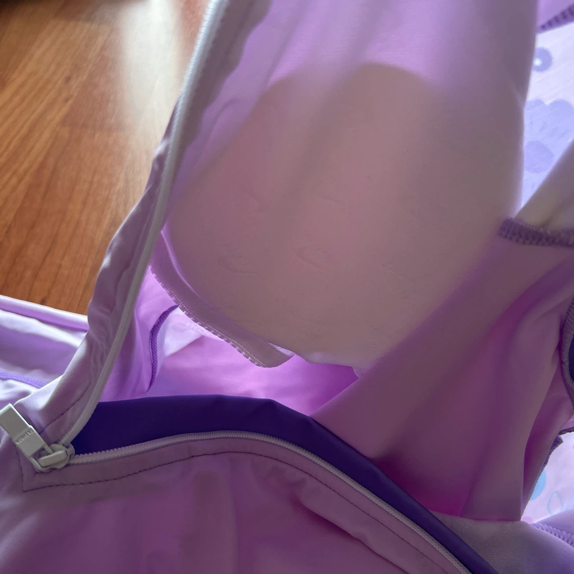 Children's Purple Swimsuit with Floral Sleeves - photo 3