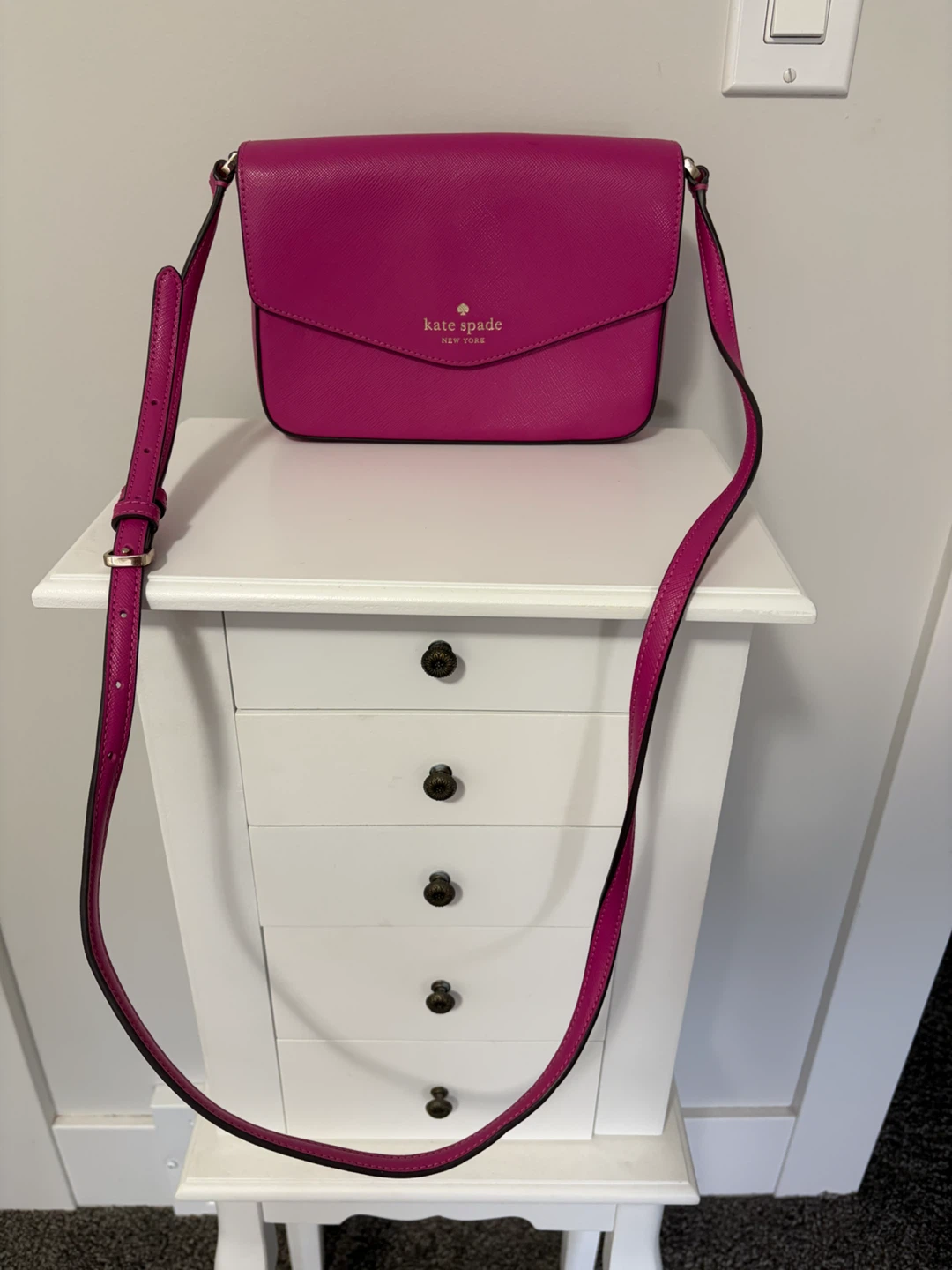 Vibrant pink Kate Spade Sadie Envelope Crossbody