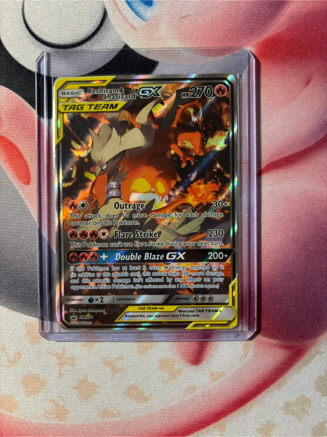 Reshiram & Charizard GX Tag Team Pokémon Card