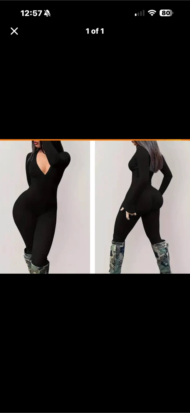 Brand New Black long-sleeve jumpsuit. Size small
