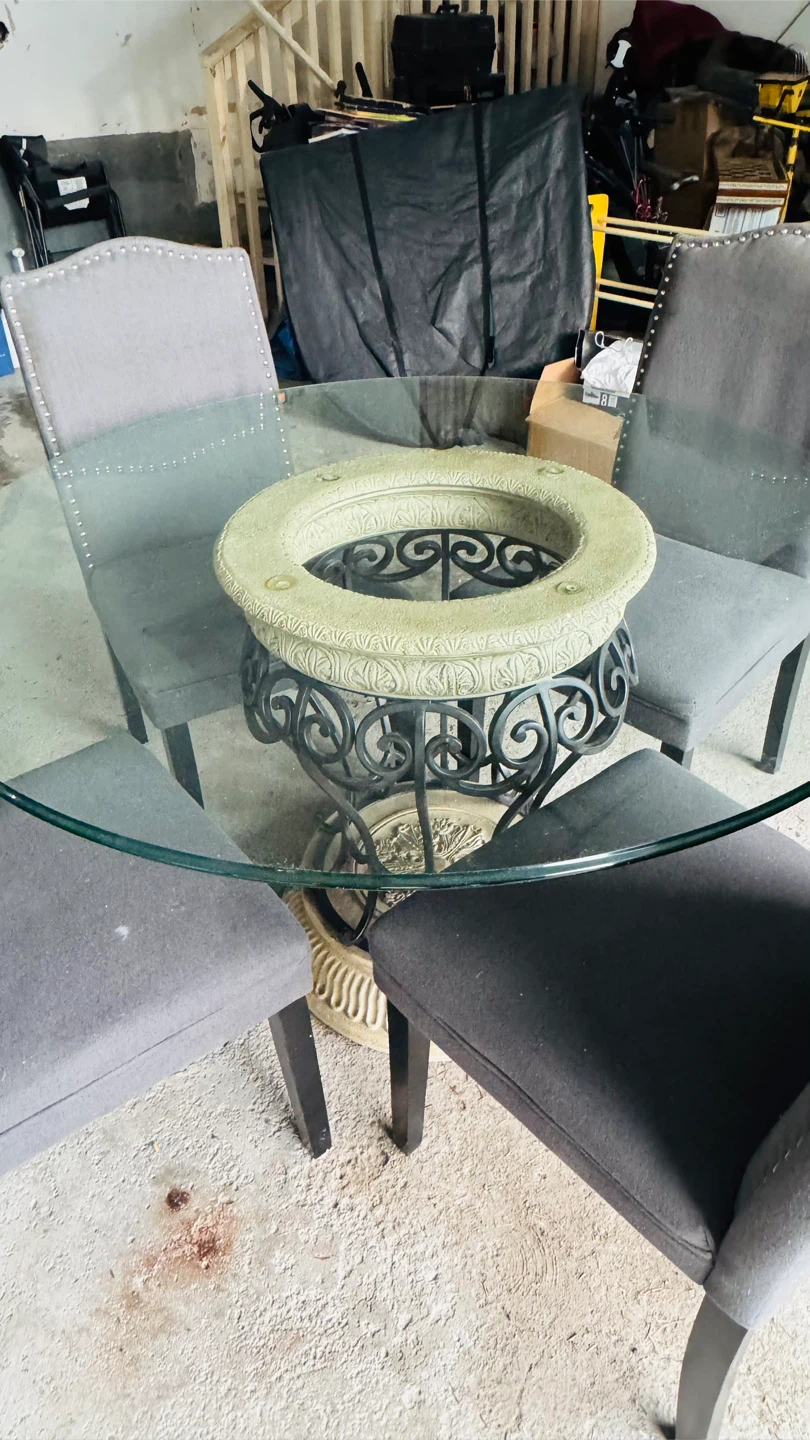 Round Glass Dining Table with Ornate Pedestal Base