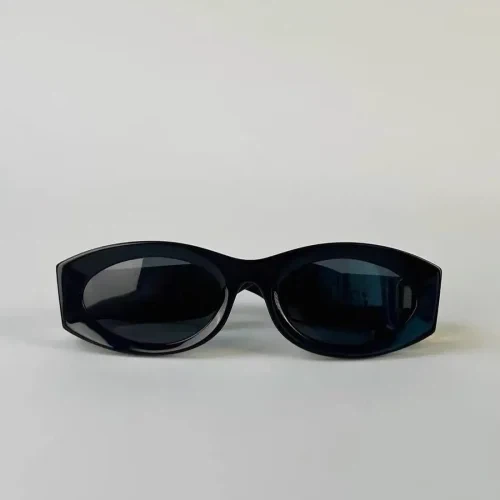 Miu Miu Black Oval Sunglasses with Gold Logo - photo 5