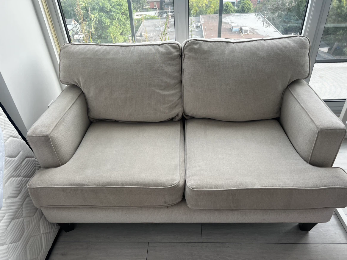 Cream two seater couch
