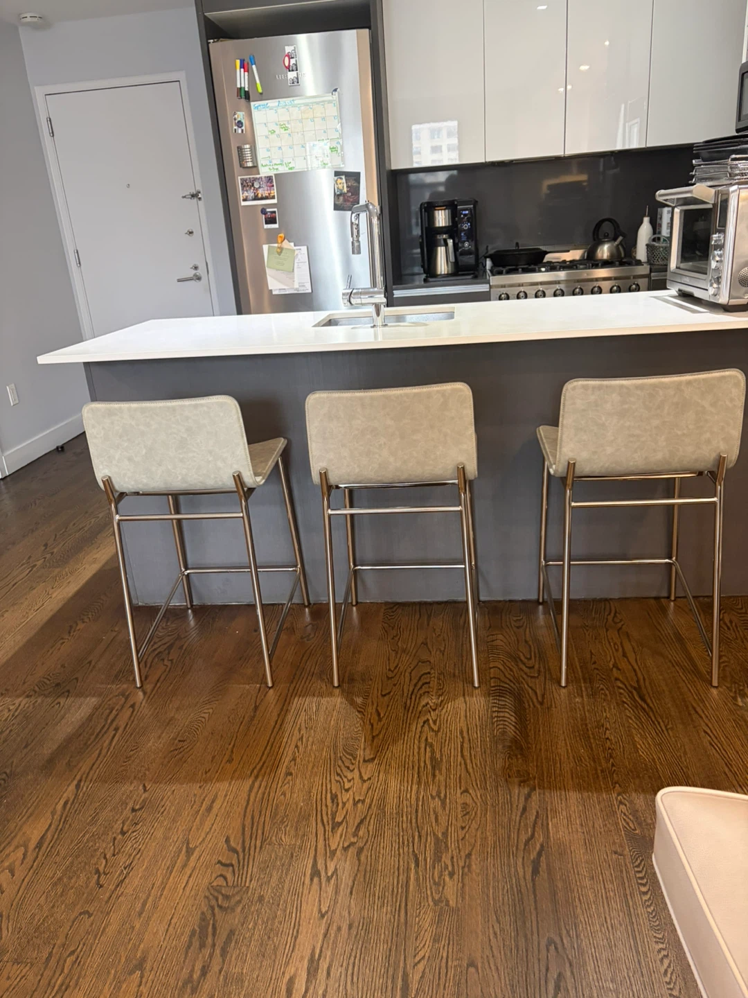 3 Modern CB2 Light Gray Faux Leather Bar Stools - photo 2