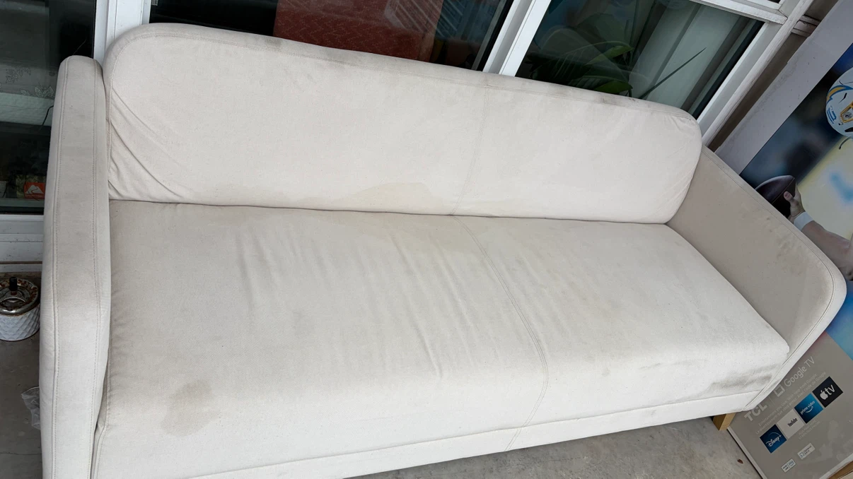 Cream coloured fabric sofa