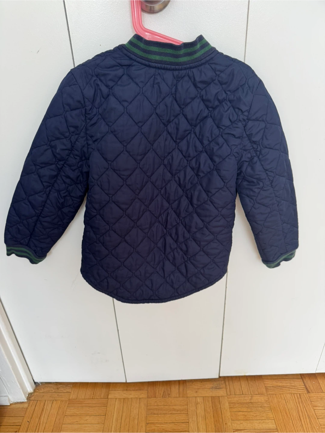 Navy Quilted Jacket with Green Trim