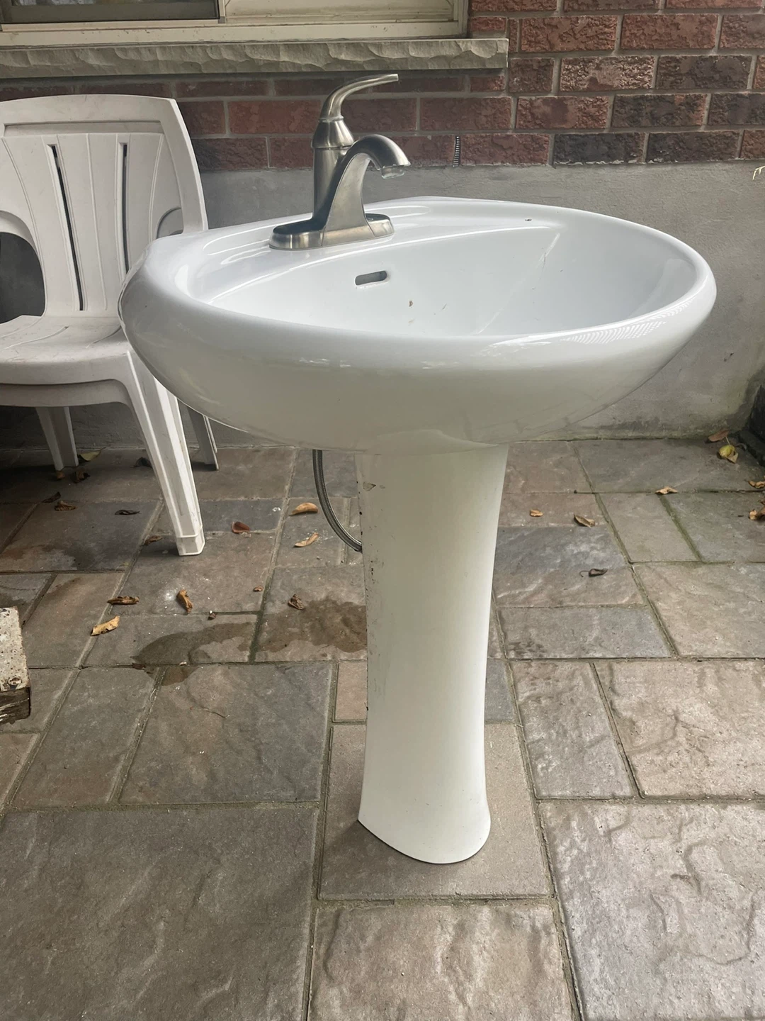 White Pedestal Sink with Faucet