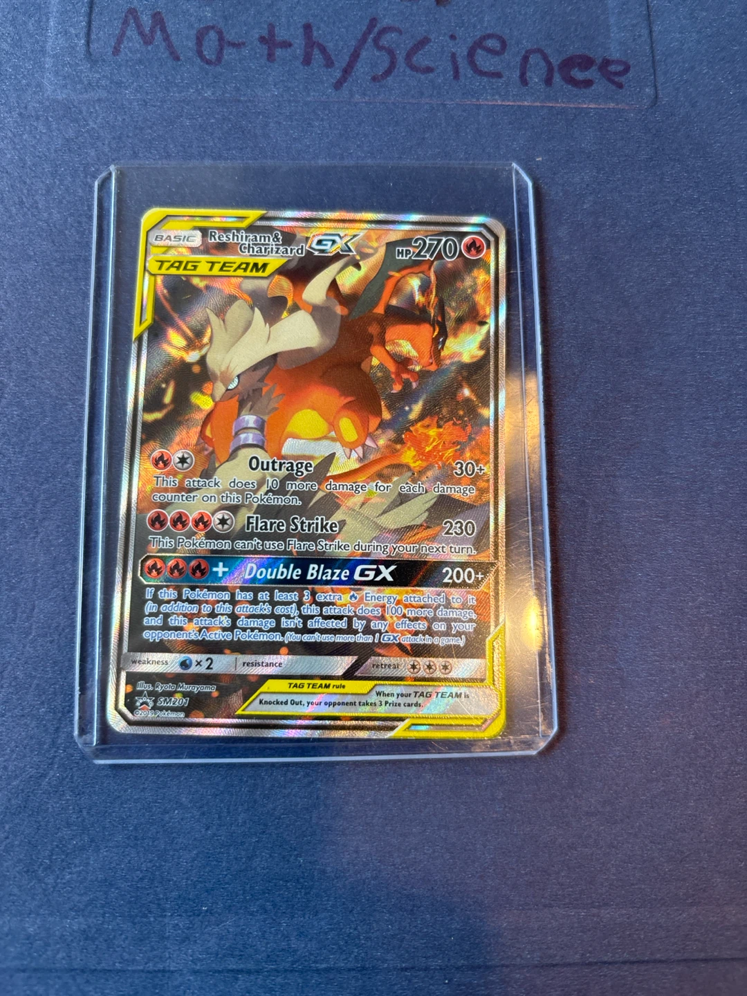 Reshiram & Charizard GX Tag Team Pokémon Card