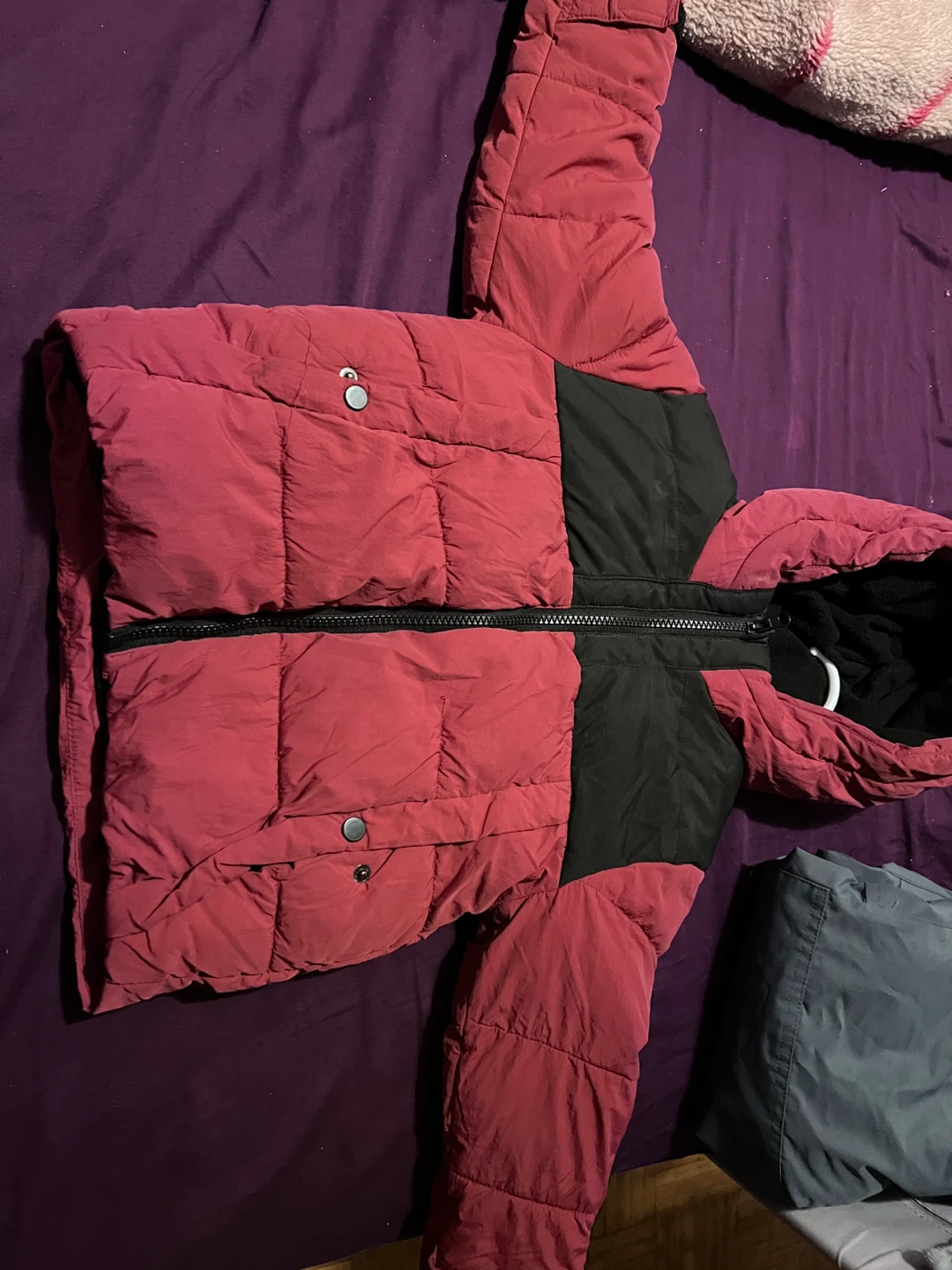 Red and black puffer jacket