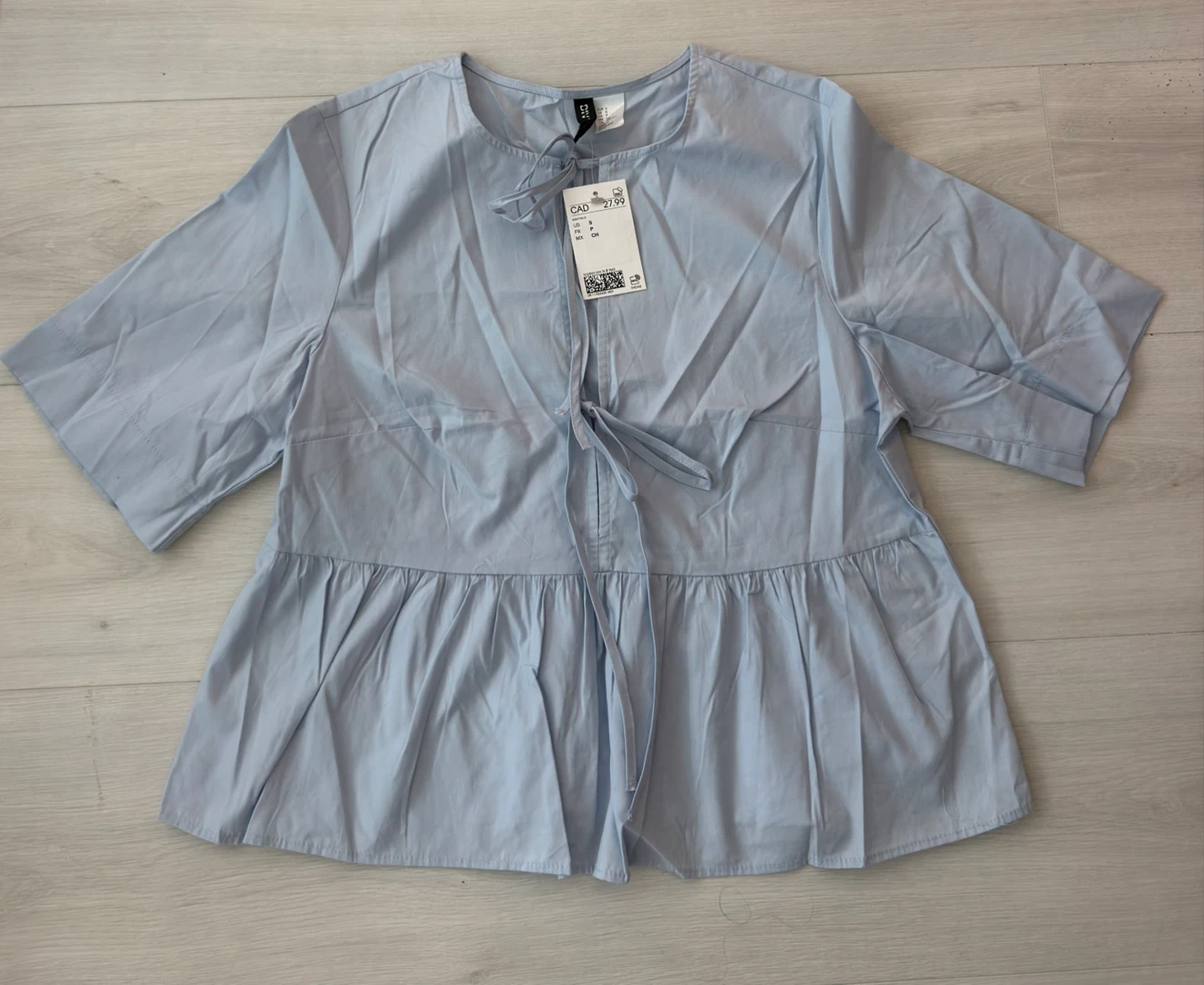 Light Blue Tie-Front Peplum Top
