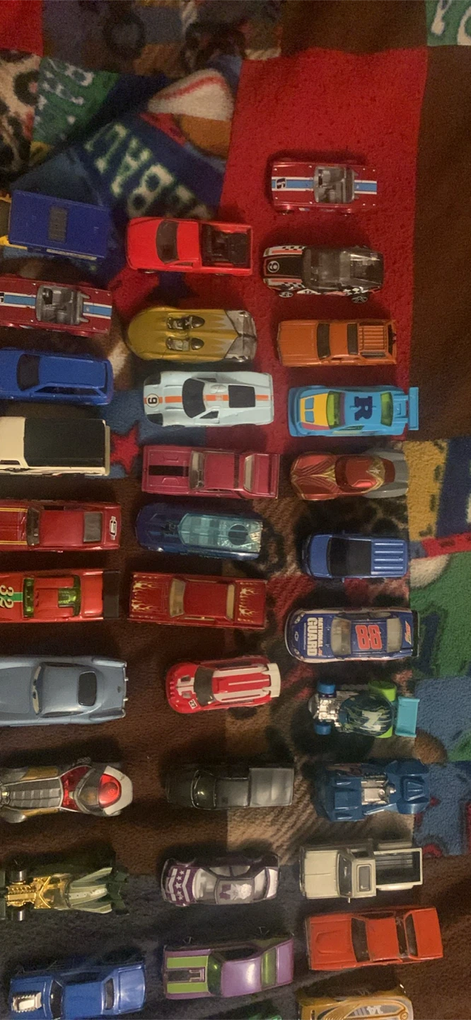Large collection of Hot Wheels toy cars with red carry case - photo 3