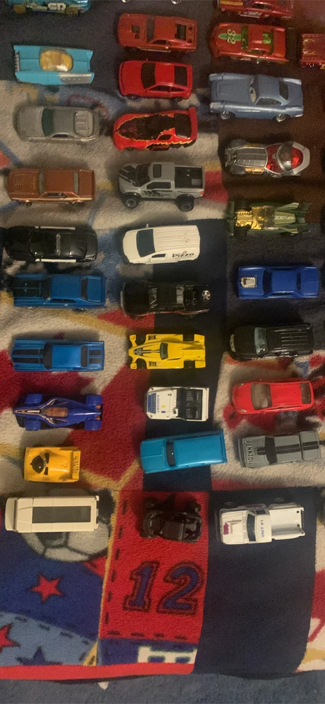 Large collection of Hot Wheels toy cars with red carry case - photo 5