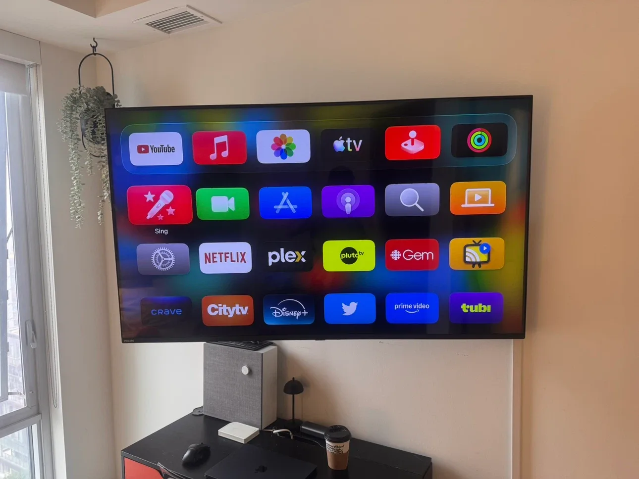 Philips 55” 4K UHD Smart Tv + Apple Tv + wall mount