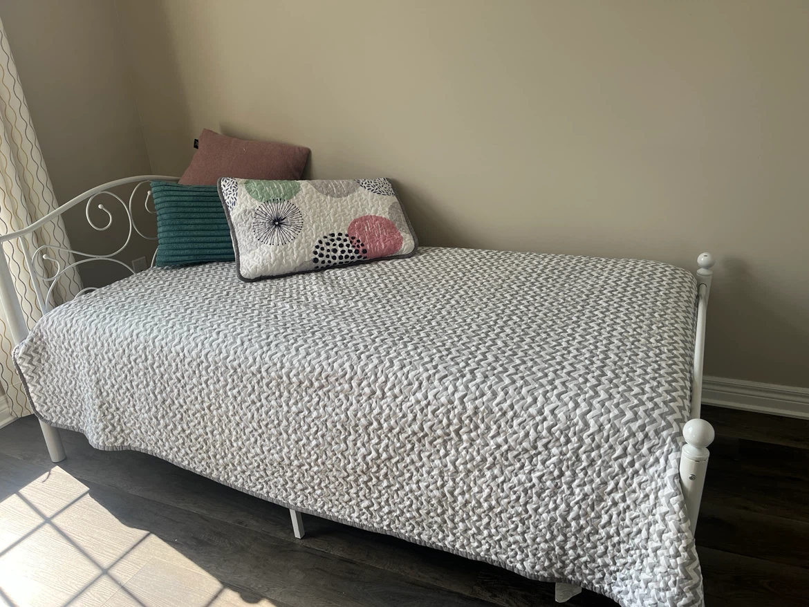White metal twin bed