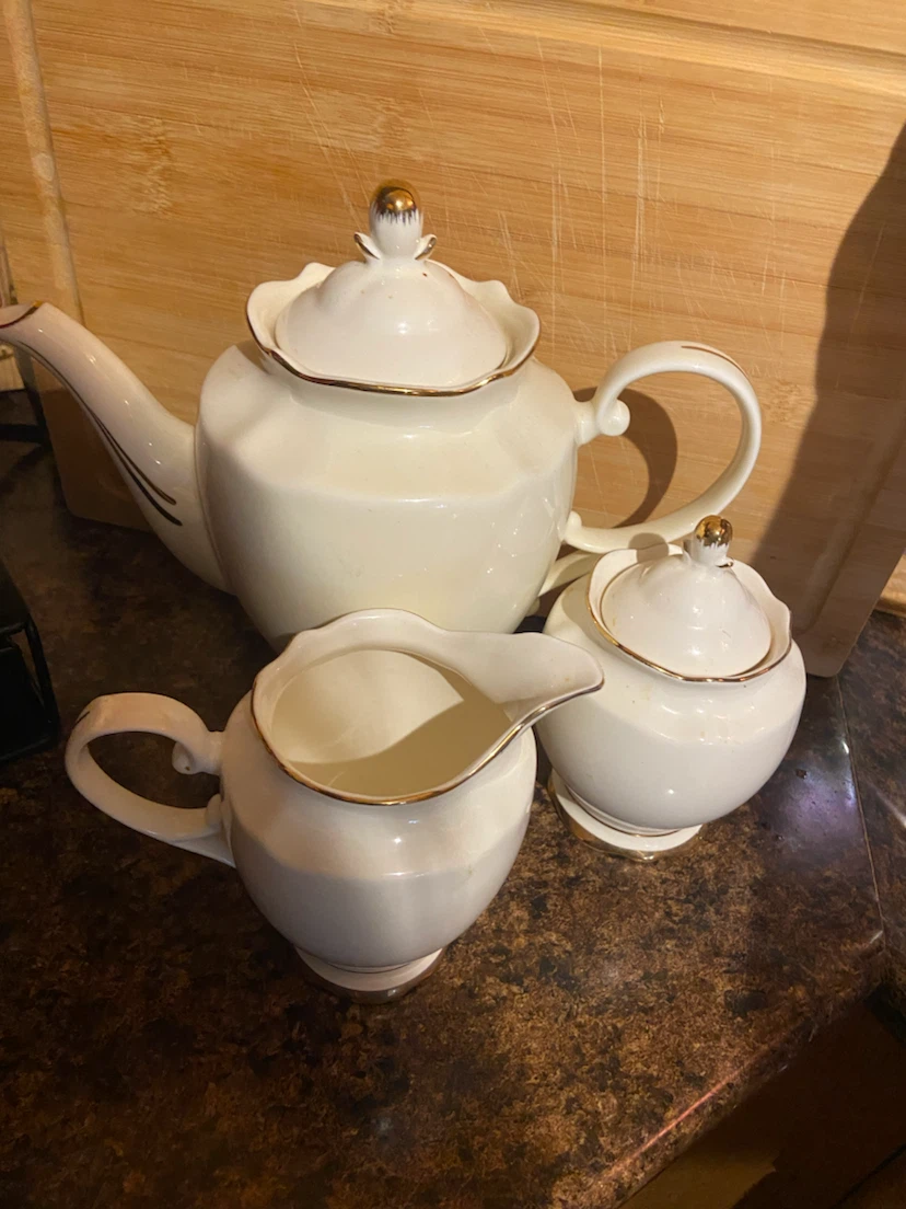 Creamer, Sugar Bowl, and Teapot Set
