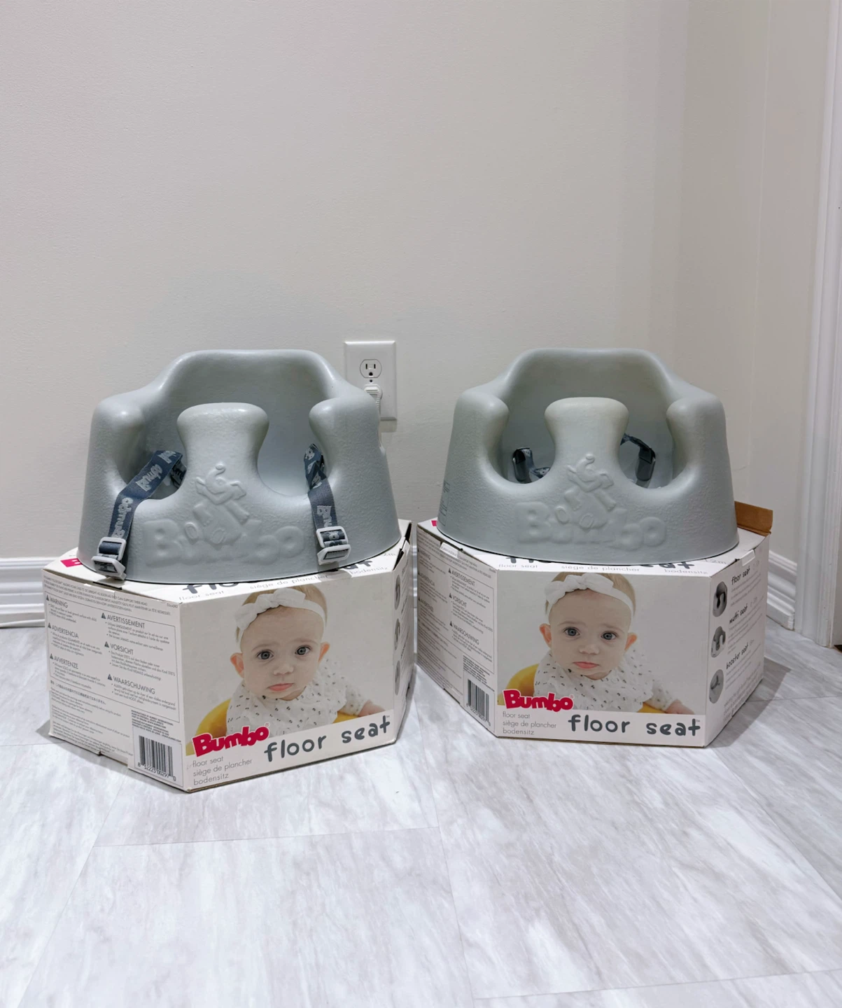 Two Bumbo Floor Seats