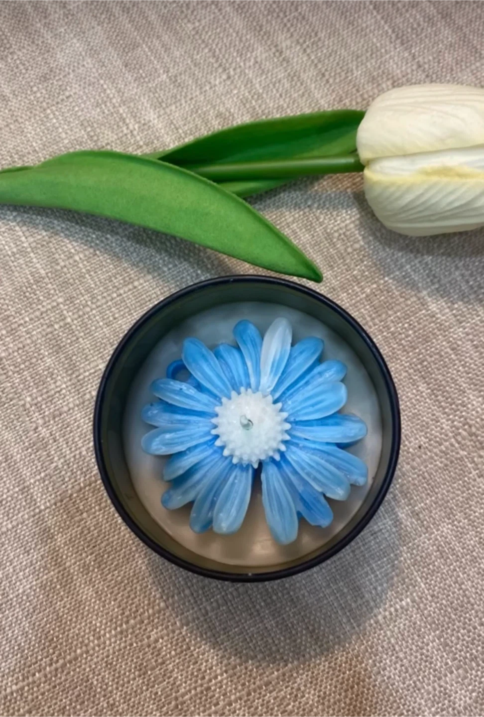 Blue flower shaped soy wax candle