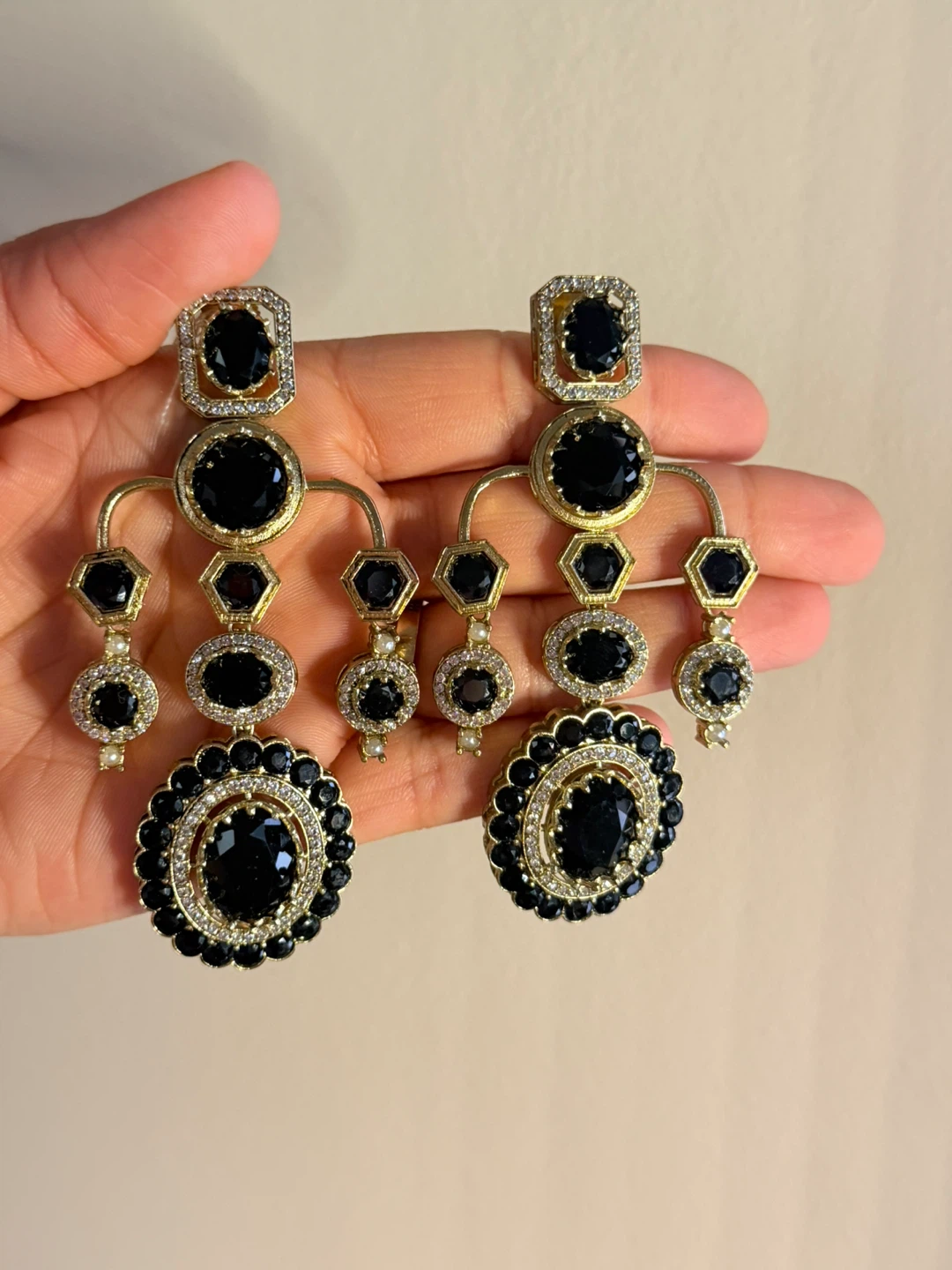 Black and gold statement earrings