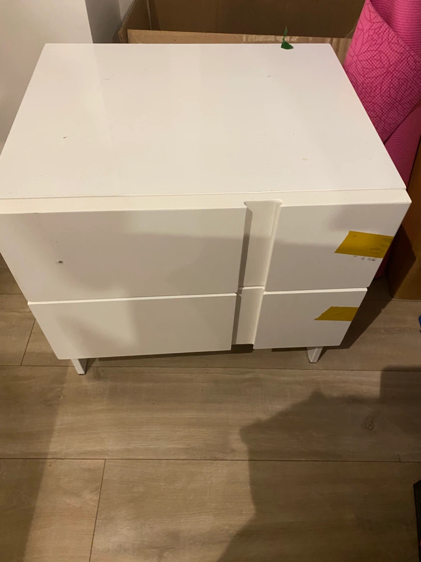 White two-drawer bedside table