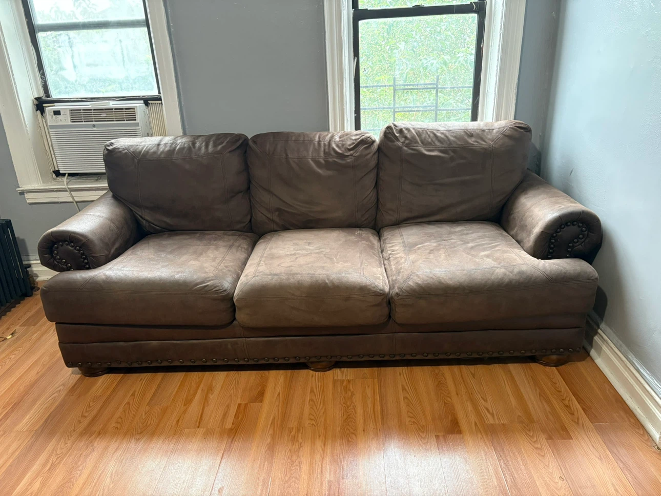 Brown Three-Seater Leather Sofa