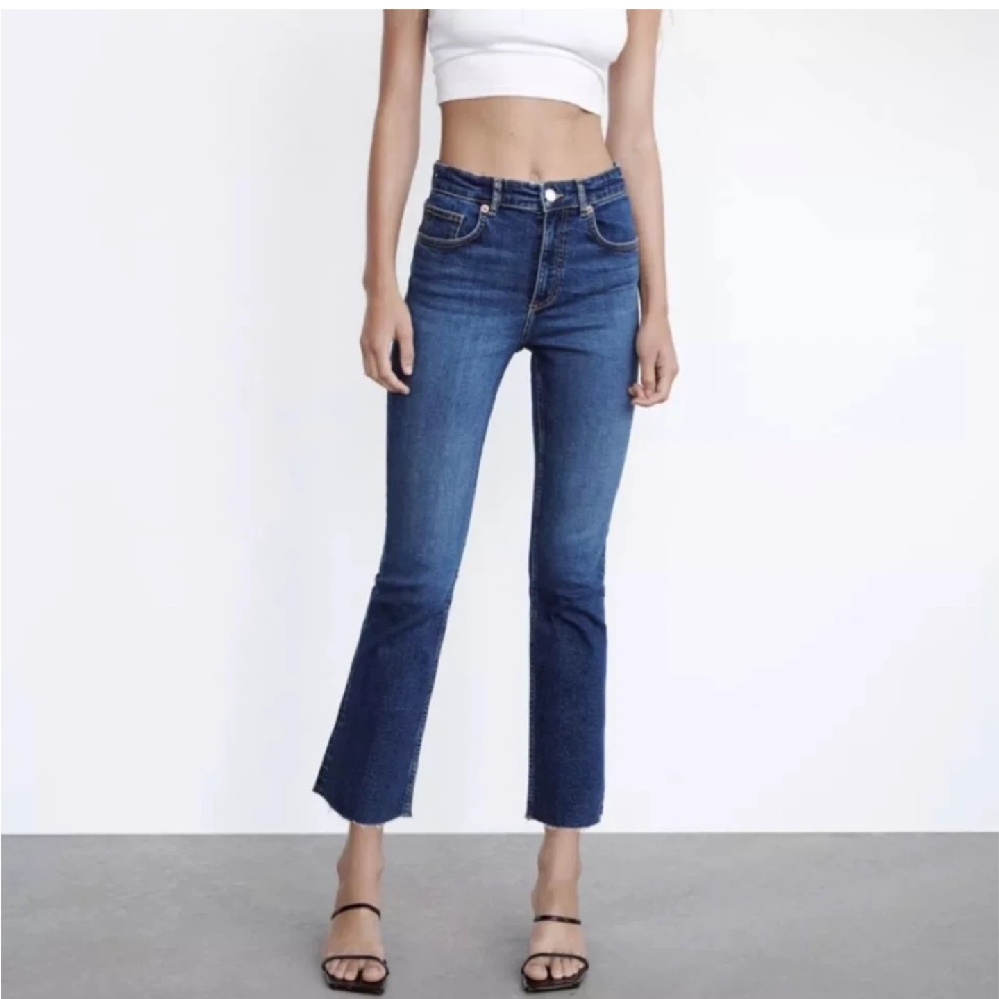 Zara cropped flare jeans with raw hem (size 28)