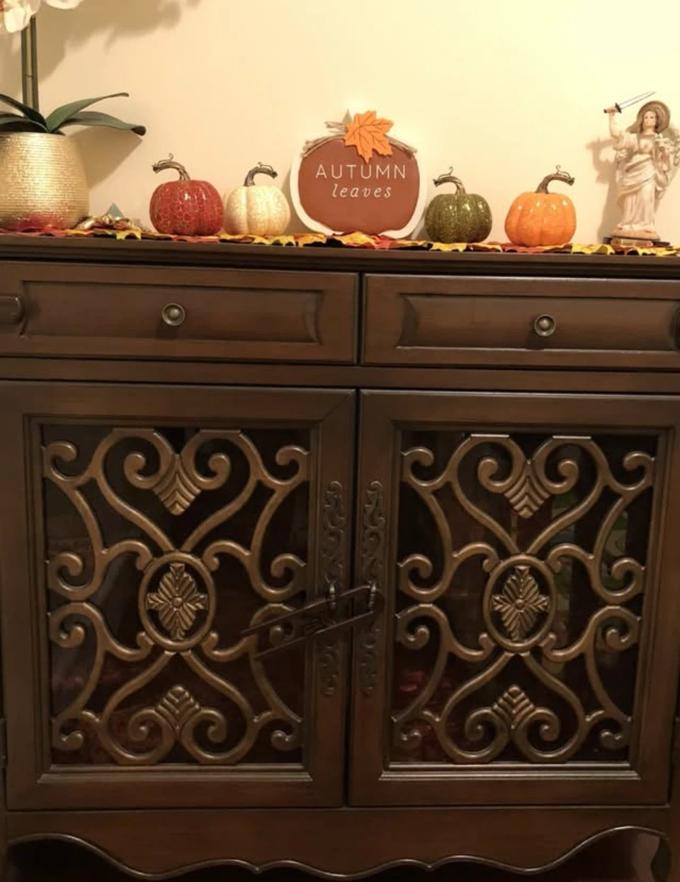 Wooden Cabinet with Decorative Doors and Drawers