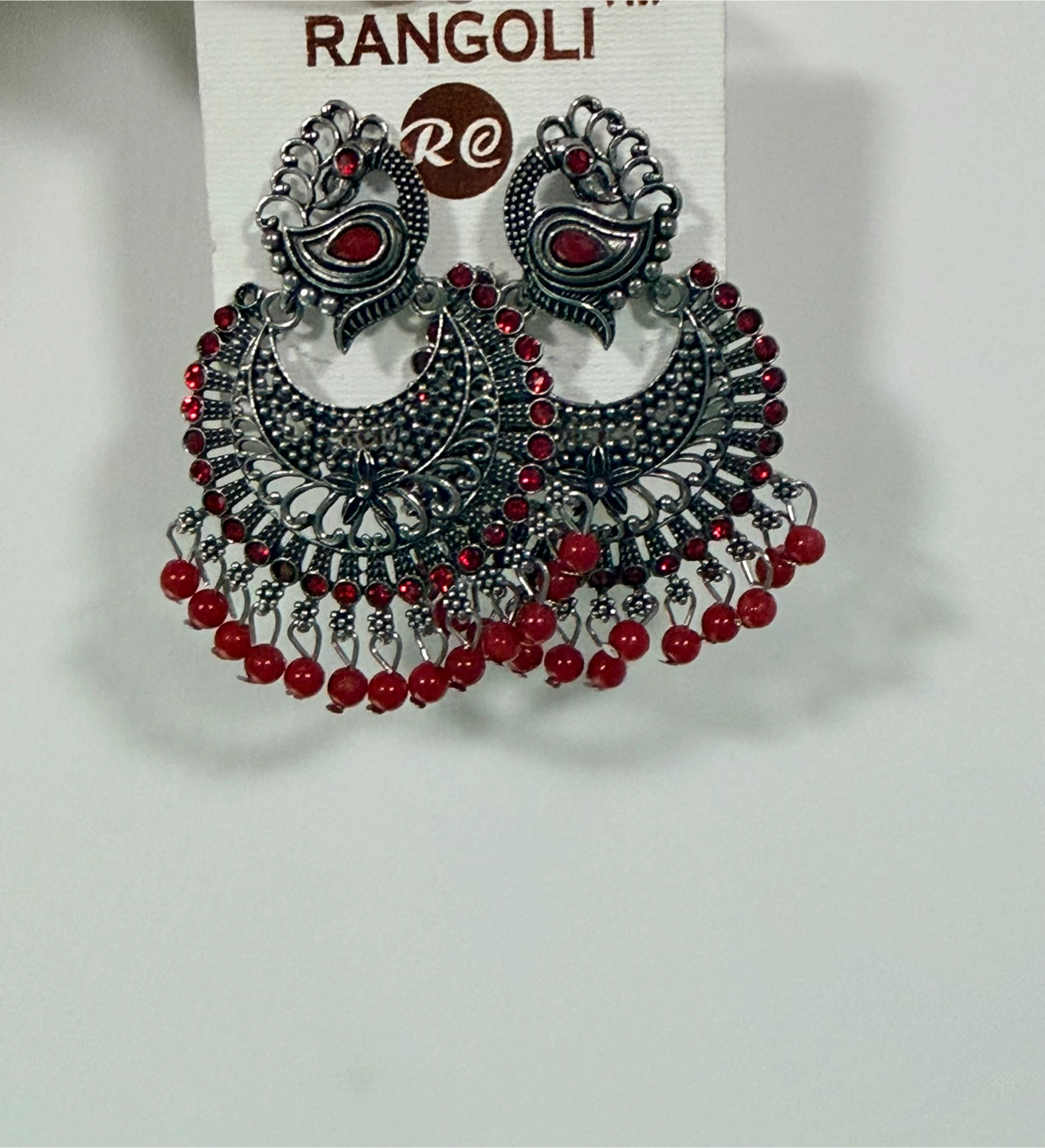 Rangoli Silver & Red Peacock Jhumka Earrings