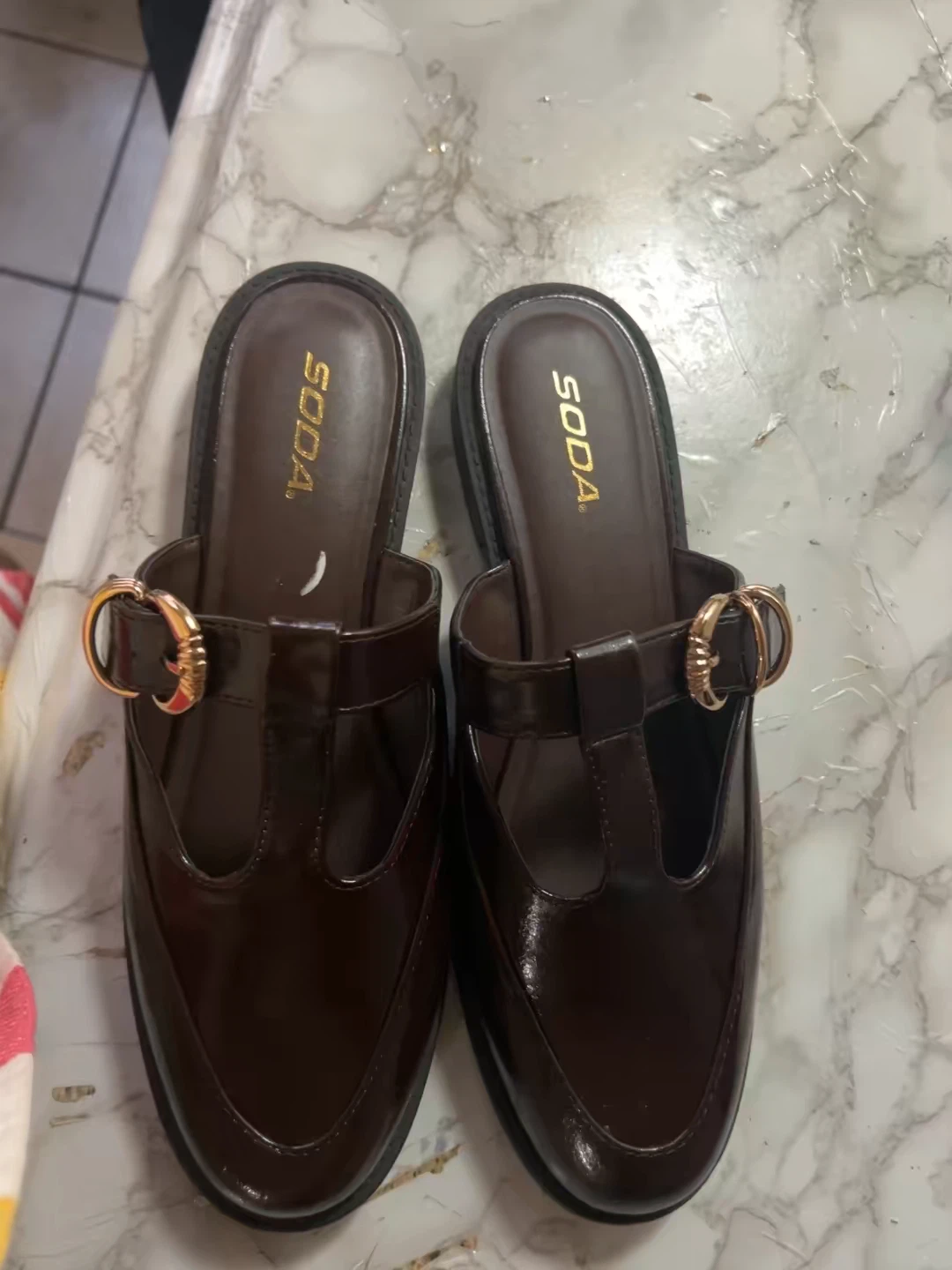 SODA brown patent mule shoes