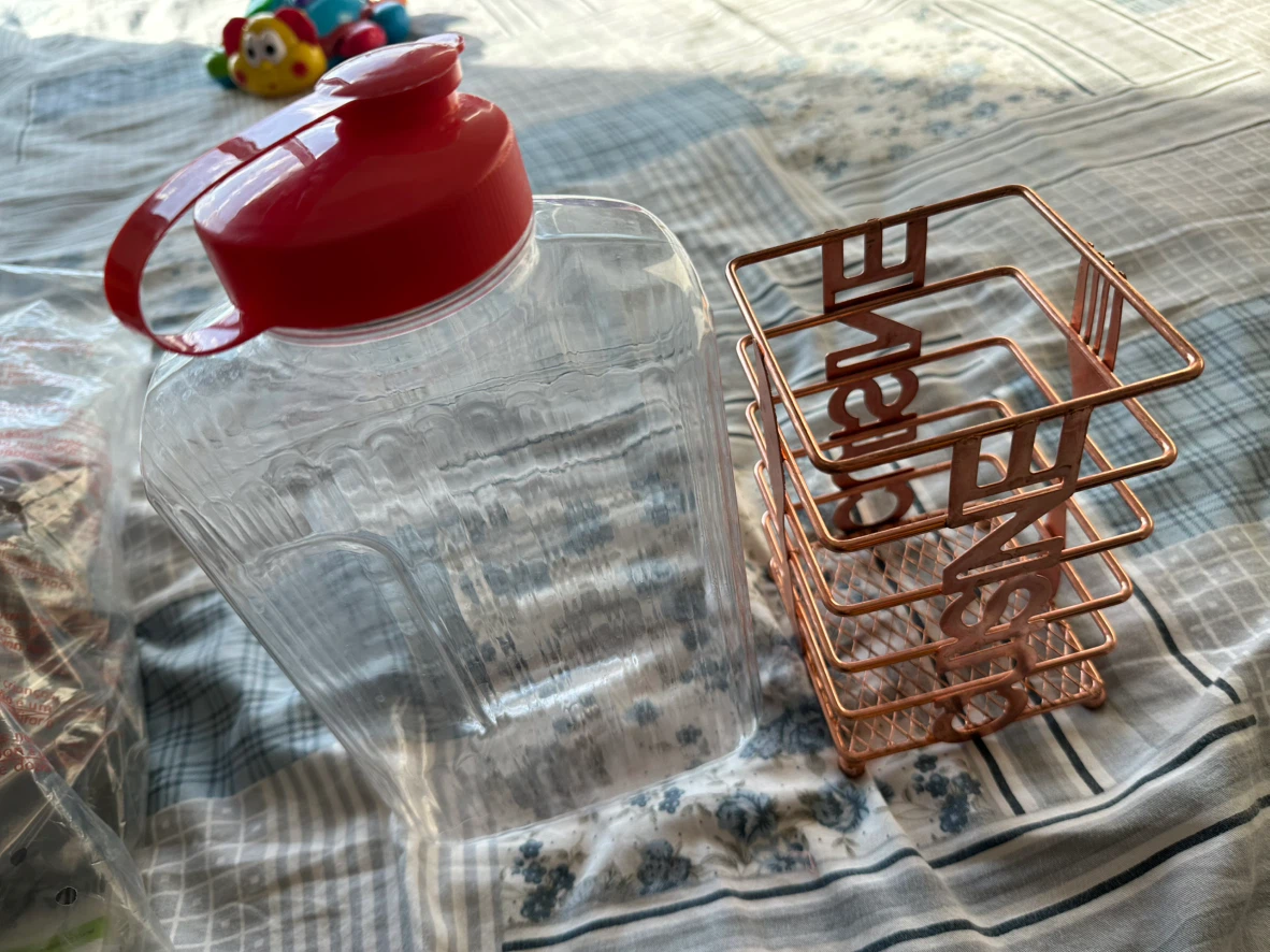 Clear Plastic Container and Rose Gold Cutlery Holder