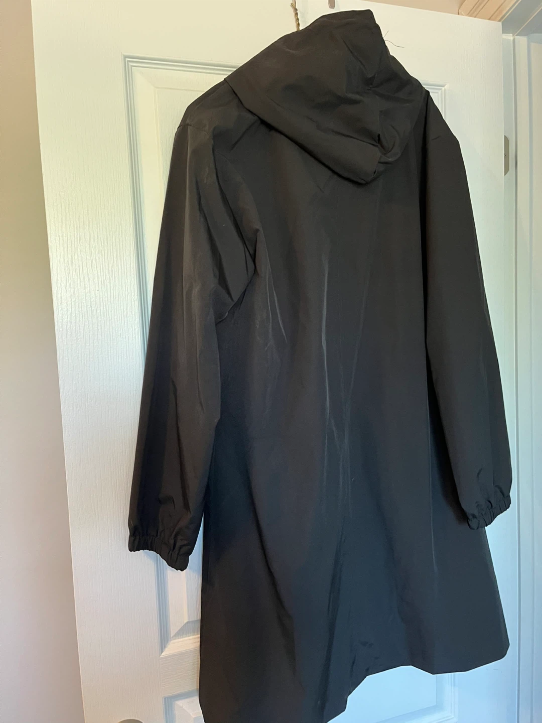 Brand new Black Hooded Rain Jacket fully lined. Medium - photo 2