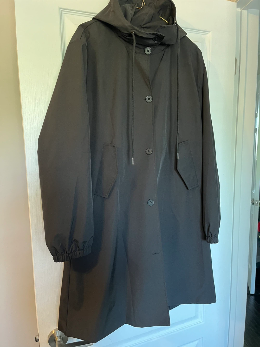 Brand new Black Hooded Rain Jacket fully lined. Medium - photo 3