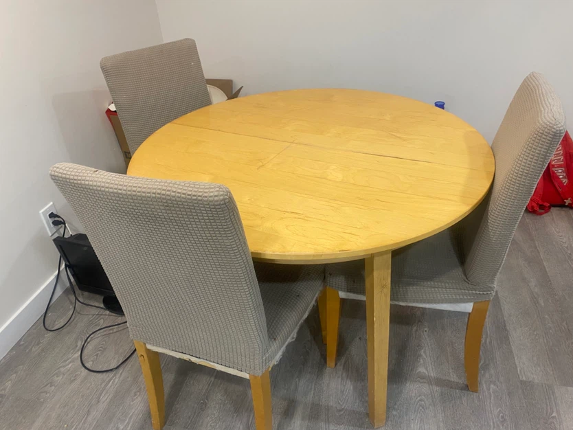 Free Round Wooden Dining Table with Three Chairs