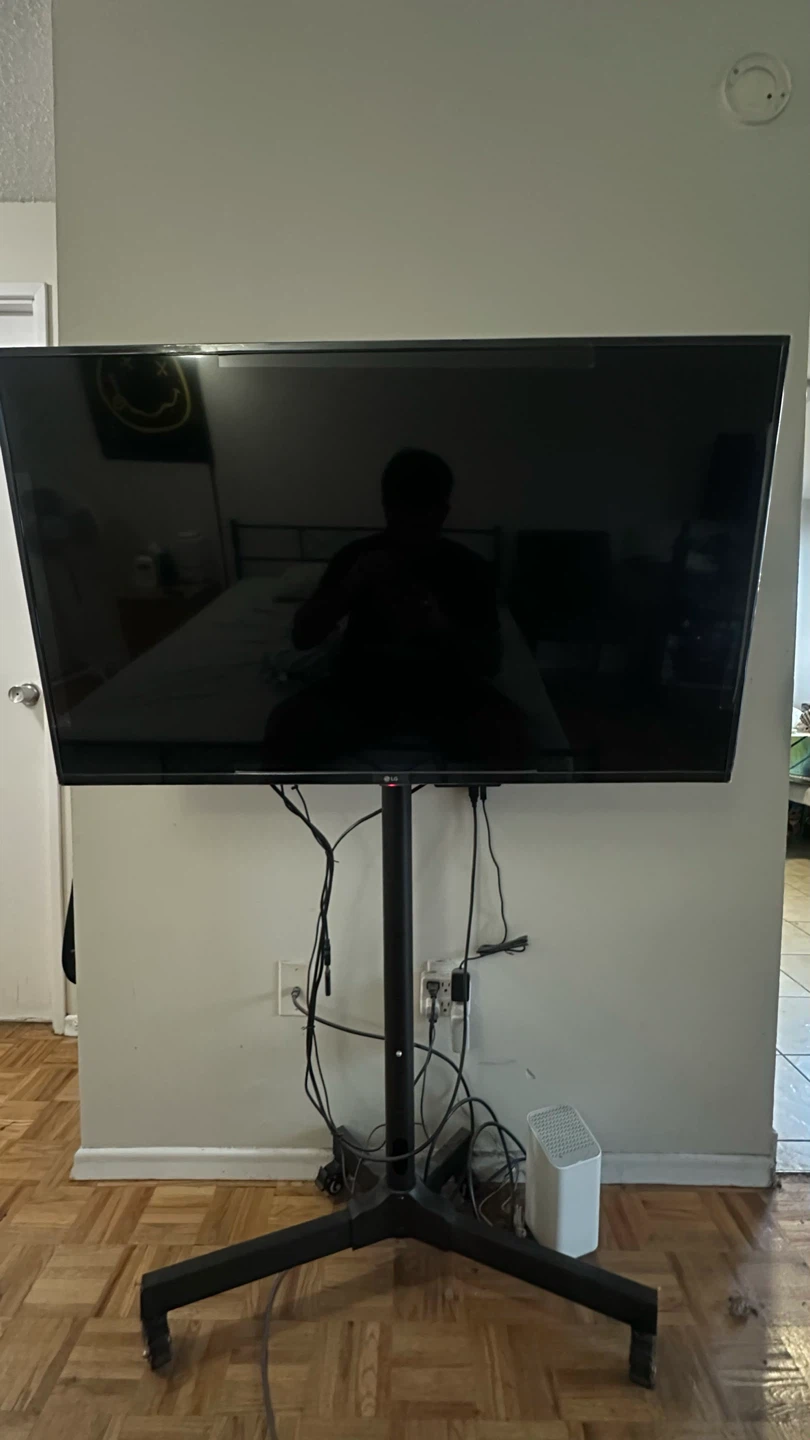 LG 43” 4k Smart TV with Floor Stand - photo 2