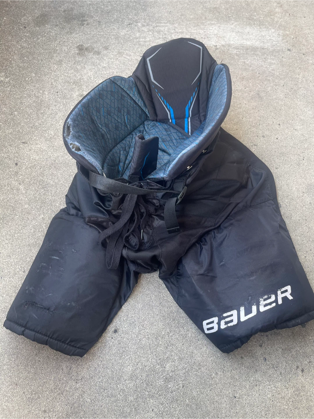 Bauer X Hockey Pants in Black, size Intermediate Large (INT L).