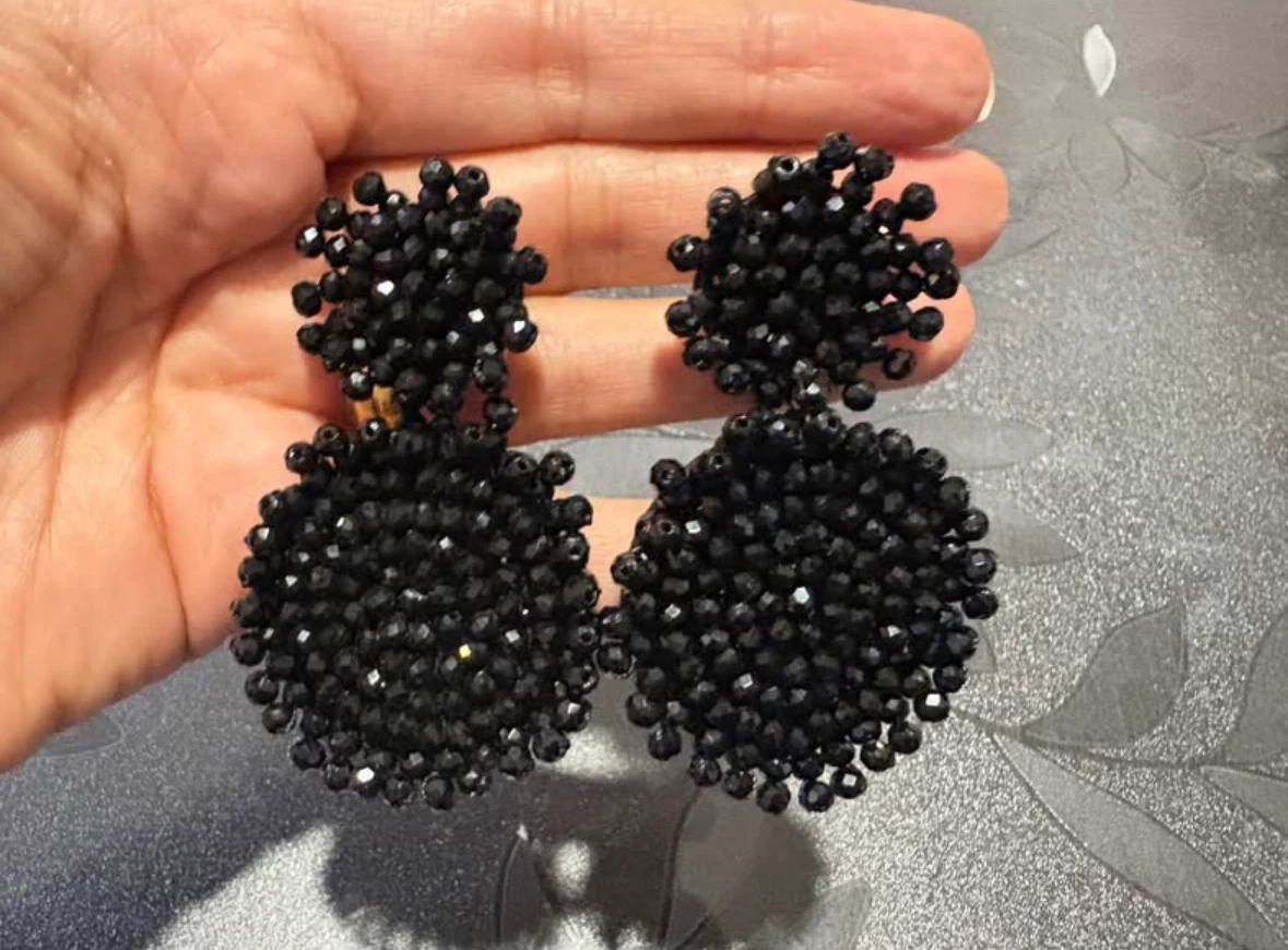 Two pairs of statement earrings