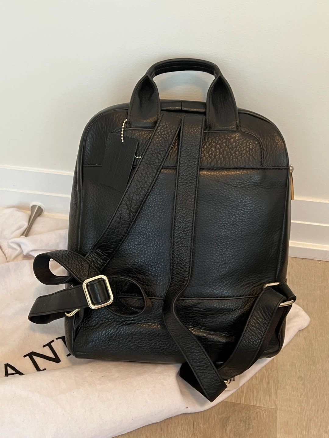 Danier Black and Leopard Print Leather Backpack - photo 2