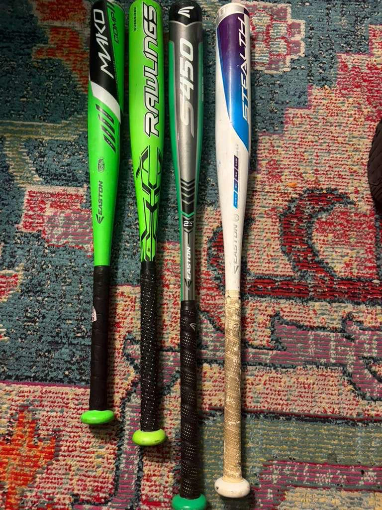 Set of 4 Baseball Bats Easton and Rawlings