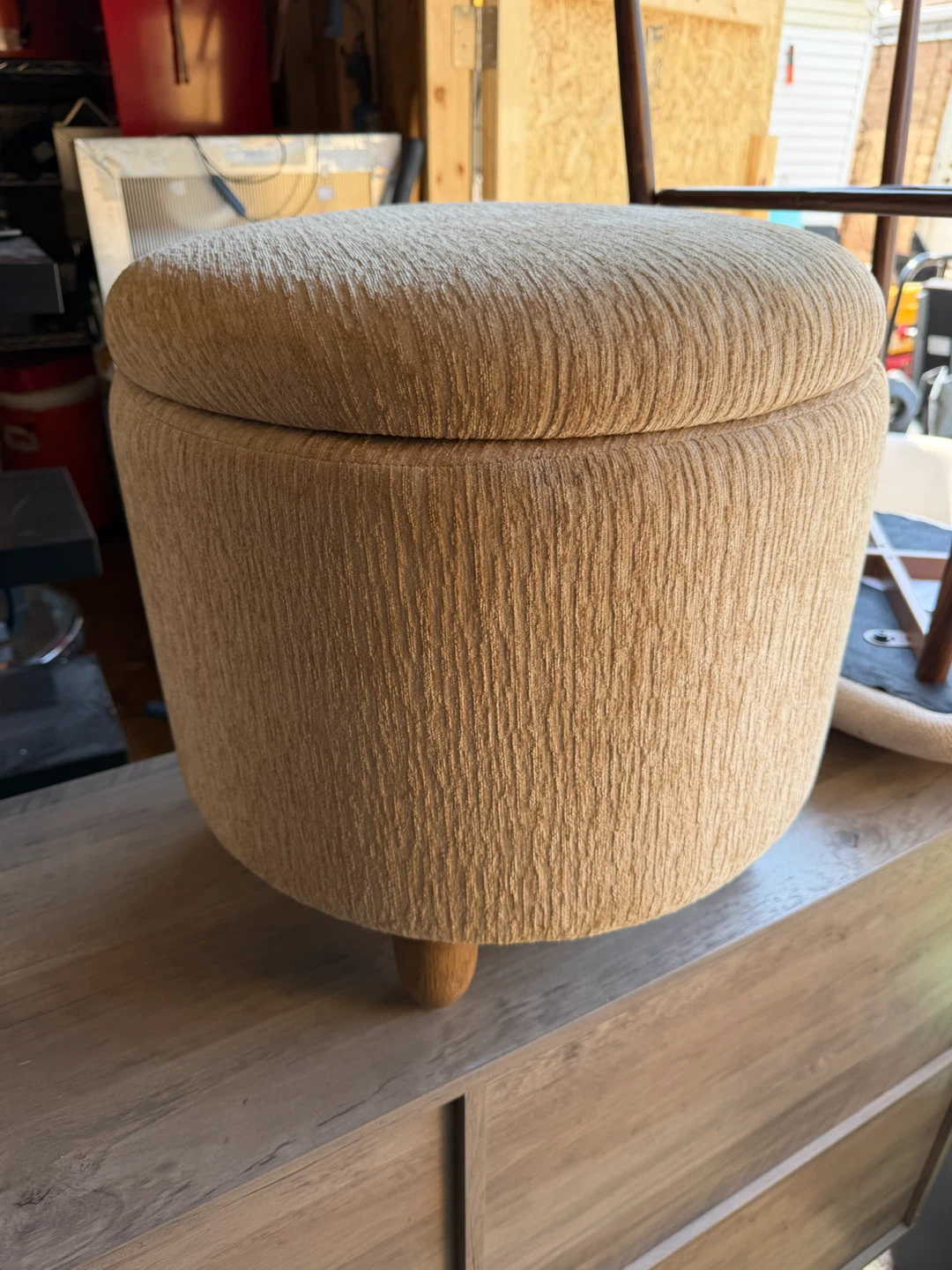 Round Tan Storage Ottoman