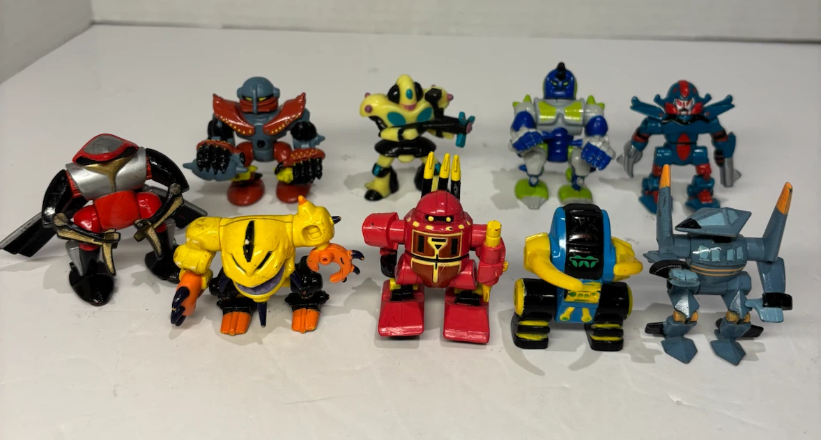 Vintage 1990s Galoob Micro Machines Z-Bots lot of 9 figures