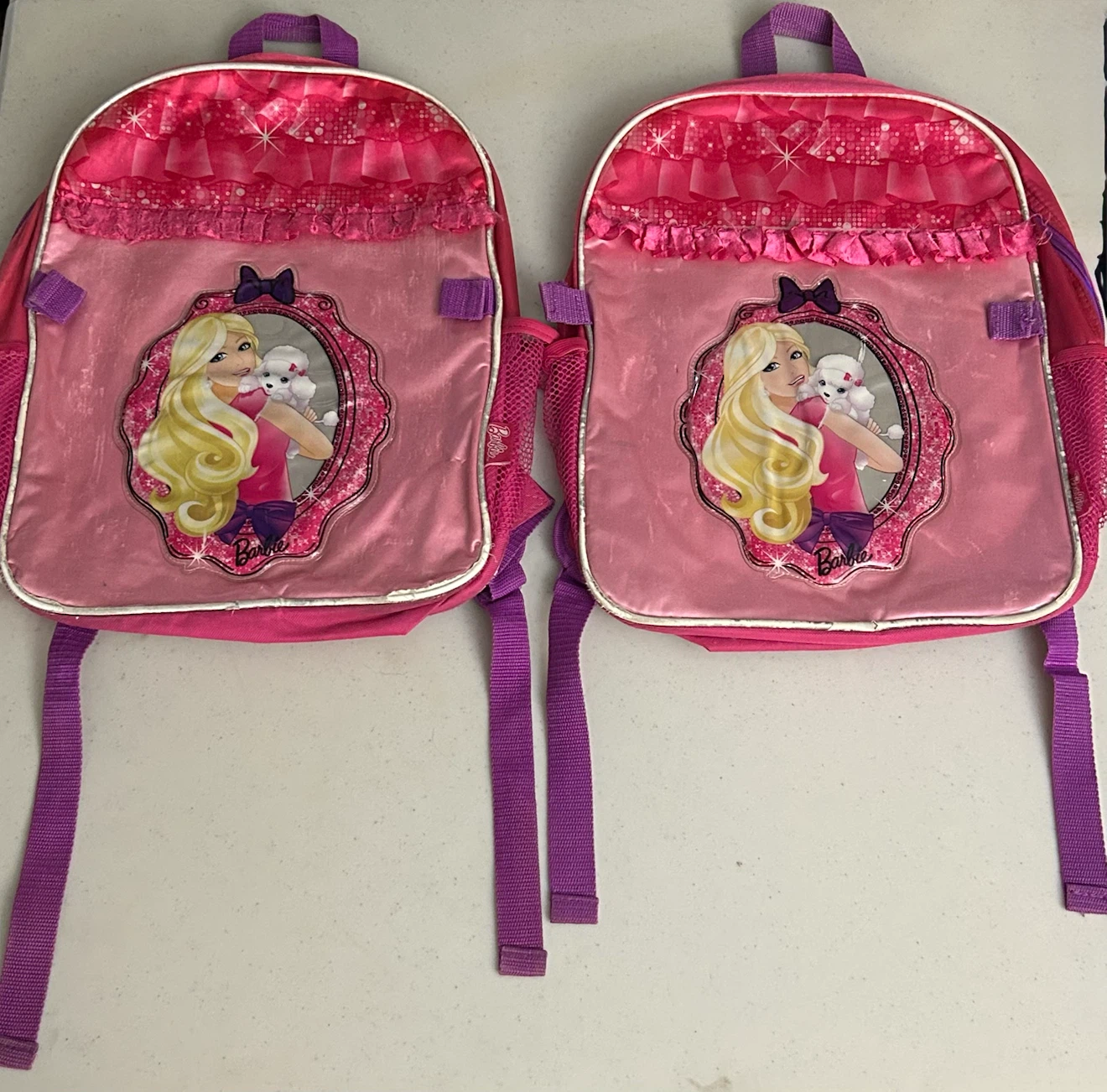 Pre-loved Pink Barbie Backpack @ $10 each