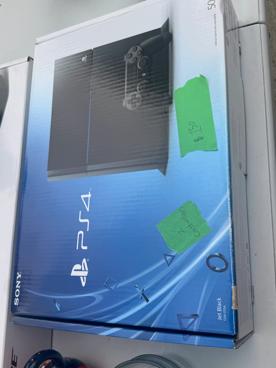 Sony PlayStation 4 Jet Black Console with 2 Controllers