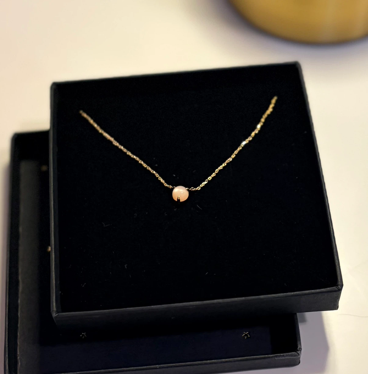 Catbird A.M. Thorne peach moonstone necklace