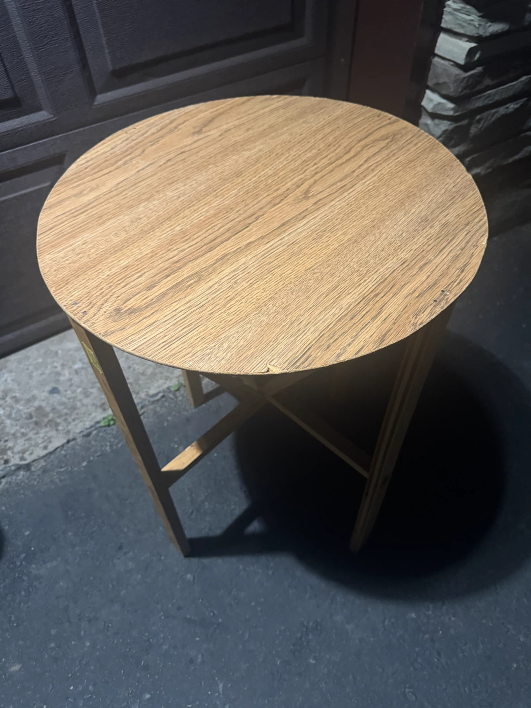 Round wooden side table