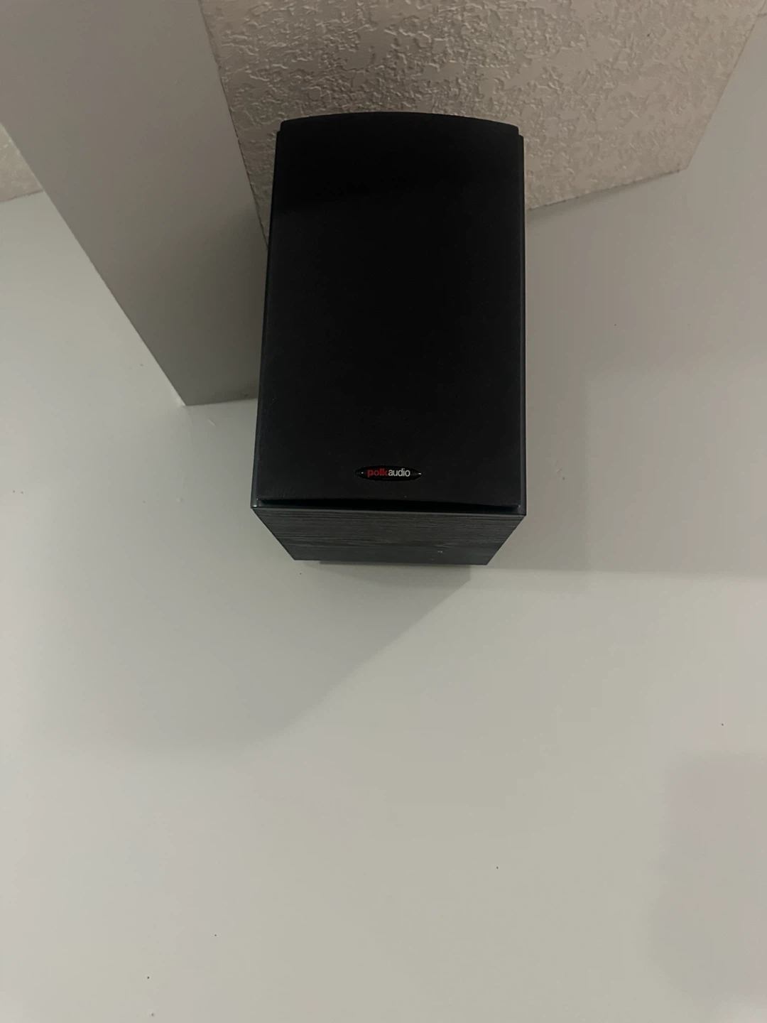 Home Cinema Projector Setup with Screen and Polk Speaker