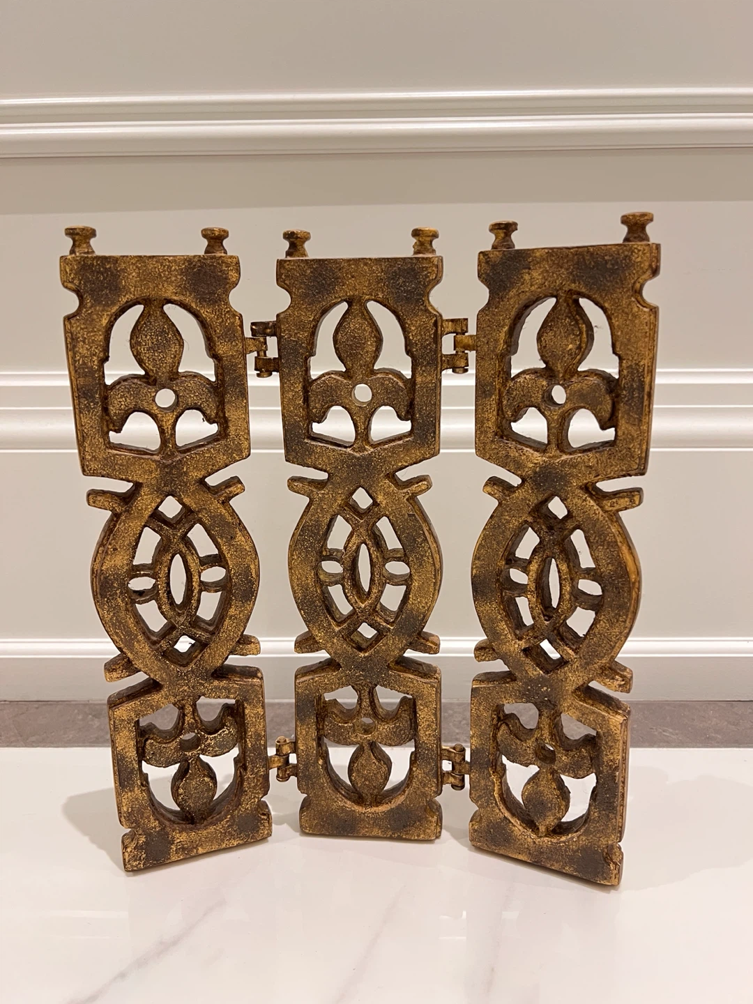 Gold-toned decorative folding screen