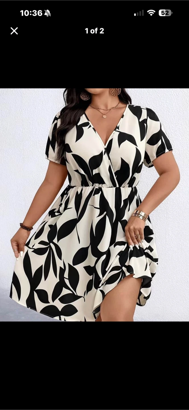 Brand New black and white leaf print wrap dress. Size 0XL