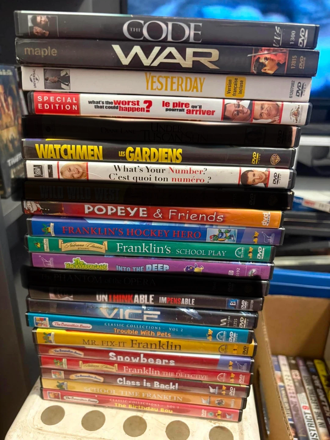 Large collection of mixed genre DVDs