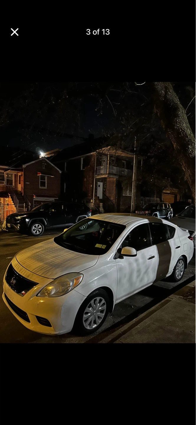 2014 Nissan Versa • SV Sedan 4D