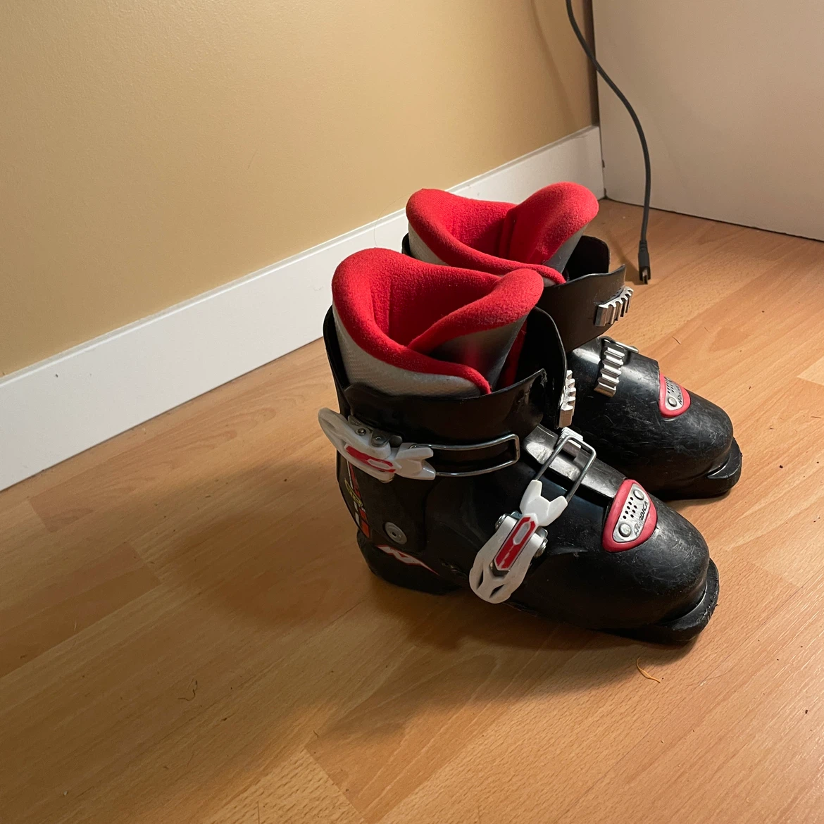 Nordica Black Ski Boots with Red Lining